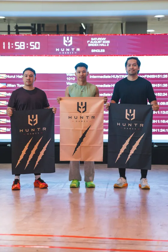 HUNTR athletes on the podium